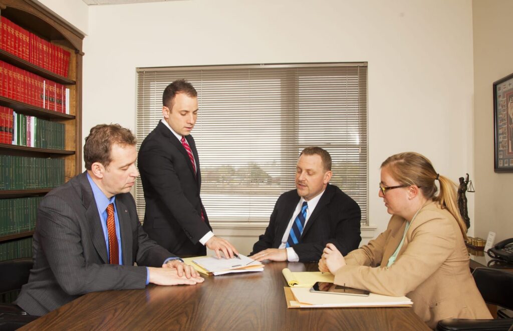Attorneys meeting in a law firm conference room